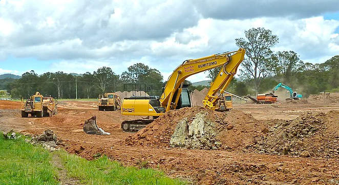 Bagger beim Straßenbau – die Anfänge von Zimmer Industries